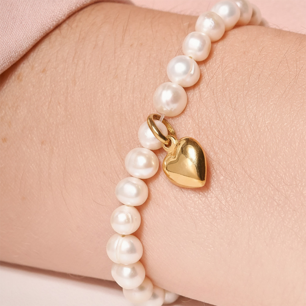 pulsera perlas con corazon bombe