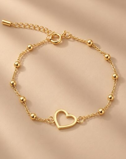 PULSERA CORAZON CALADO CON BOLITAS PLATA CON ENCHAPE DE ORO - Imagen 1