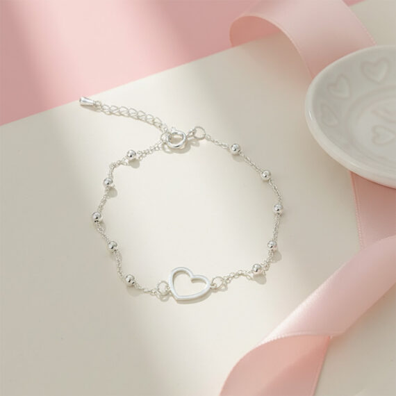 pulsera bolitas con corazon calado plata