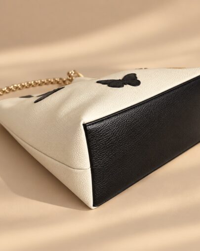 BOLSO MARIPOSAS DE CUERO MARFIL CON NEGRO - Imagen 4