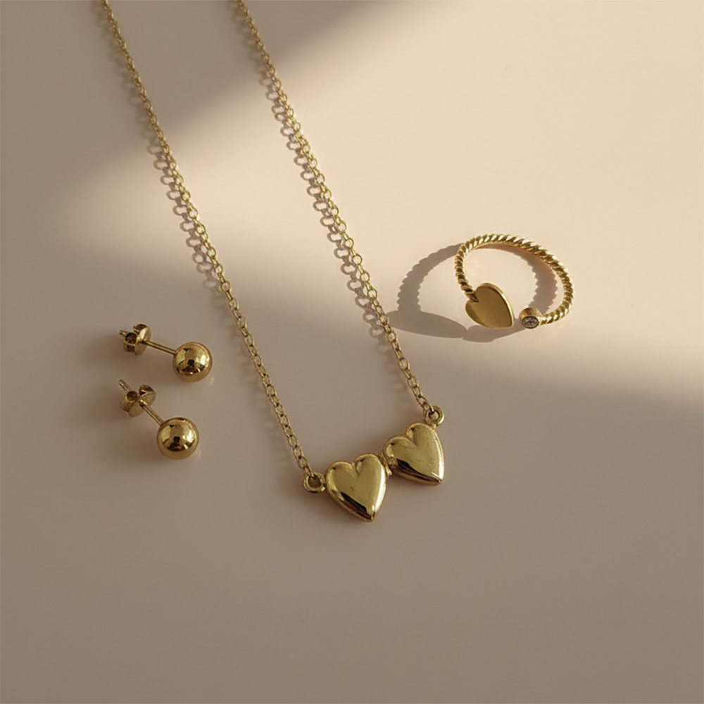 cad doble corazon arete enlazad y anillo entorchad