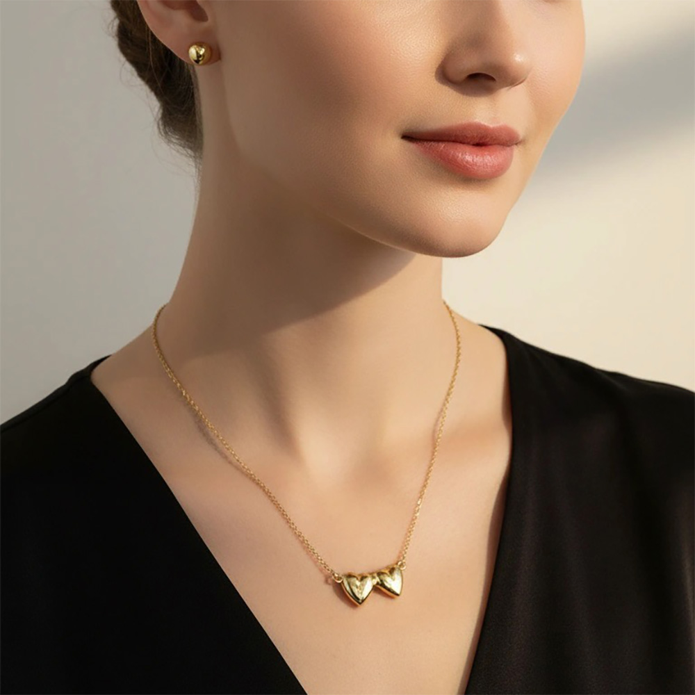cadena doble corazon y aretes bola